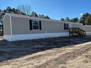 Building Photo - NEW 3 BEDROOM 2 BATH SINGLEWIDE MOBILE HOME LOCATED IN EAGLE SPRINGS! $1,300 RENT $1,300 DEPOSIT