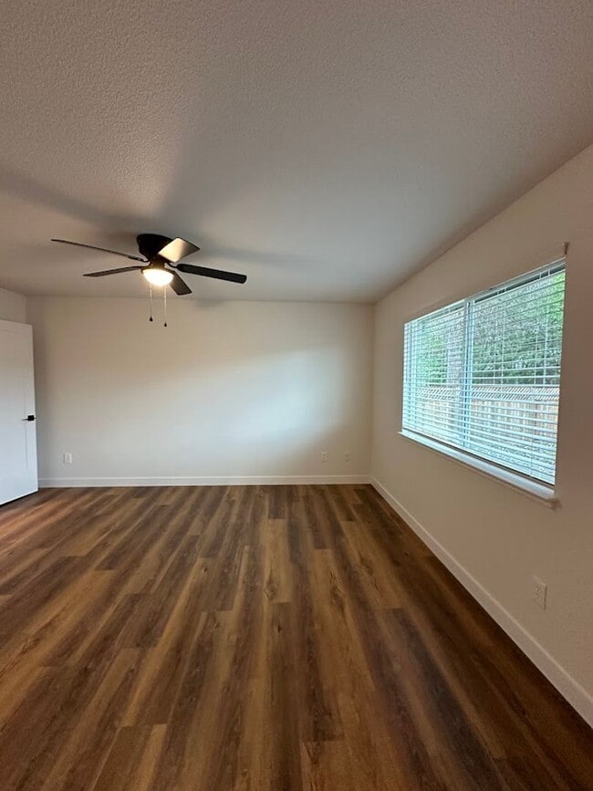 Building Photo - Updated Home with Island Kitchen, LVP Flooring, and Yard Care Included!