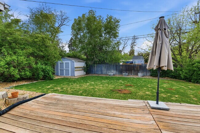 Building Photo - $3,045.95, 3 bed, 2 bath house in Denver with Fenced in Yard and In Unit Laundry!