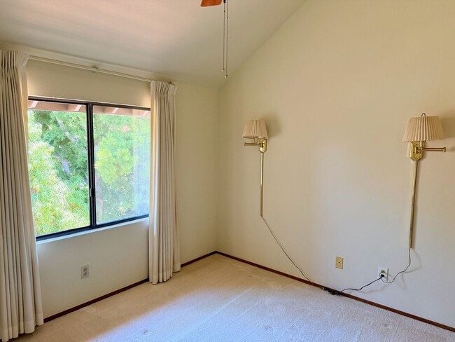 Building Photo - Private Oasis with Sunroom, Balcony & Lush Landscaping | 4BR Home Near Community Pool & Spa