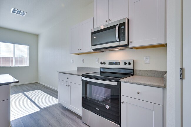 Building Photo - NW 3 Bedroom Townhouse!! Gated Community Pool!! 2 Car Garage!!! No Carpet downstairs.