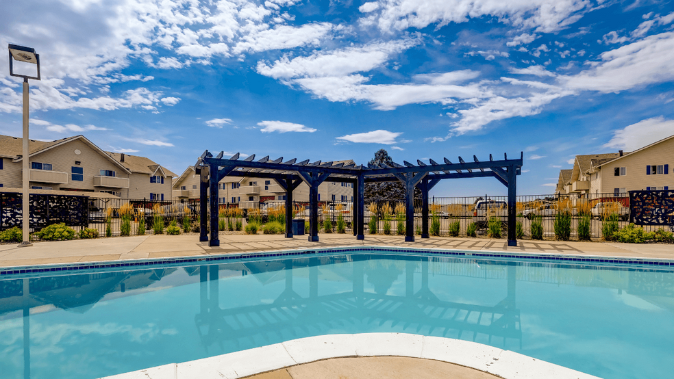 Outdoor Pool - Aurora Meadows Apartments