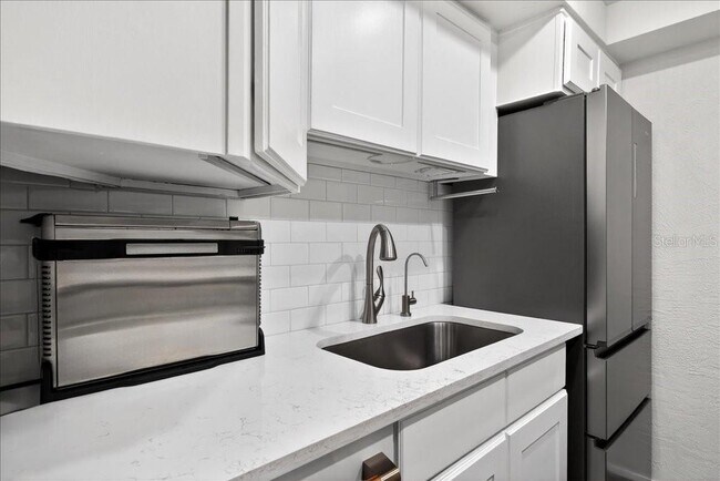 Building Photo - 1 N Ocean Palm Villas