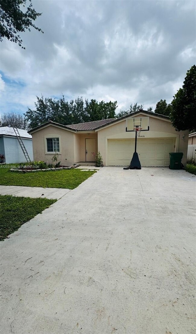 Building Photo - 10420 SW 24th Ct