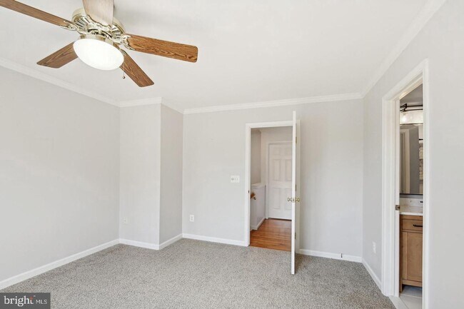 Building Photo - Amazing, updated end unit townhome backing to trees and open common area in Centre Ridge neighbor...