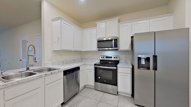 Building Photo - Jacksonville Townhome w/ Garage, Spacious Bedrooms & In-Unit Washer/Dryer