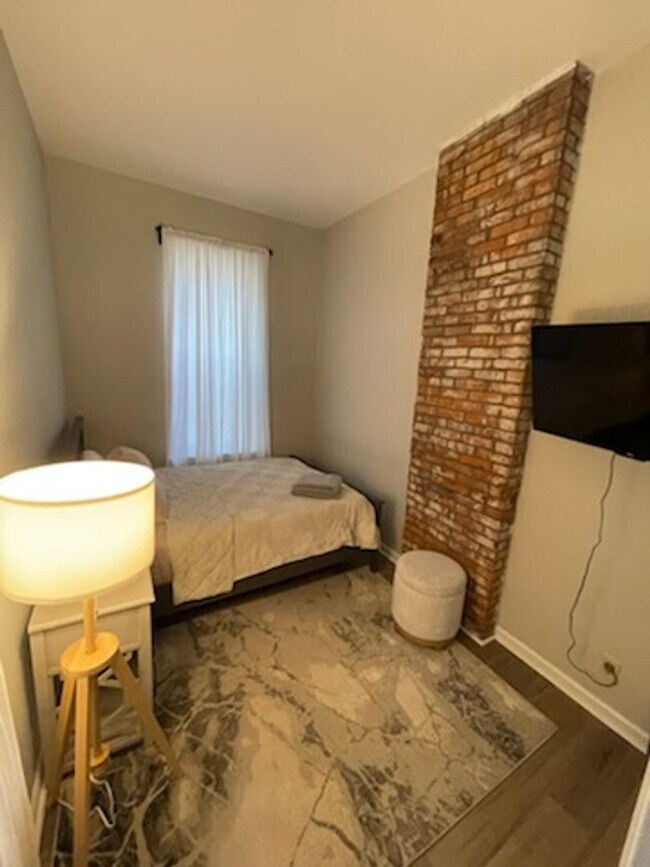 Building Photo - Menard Apartments