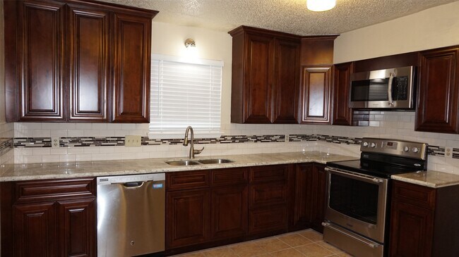 Building Photo - 9217 Carousel Ln