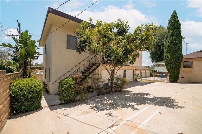 Building Photo - 7100-7104 1/2 Kittyhawk Ave. 1/2-7102