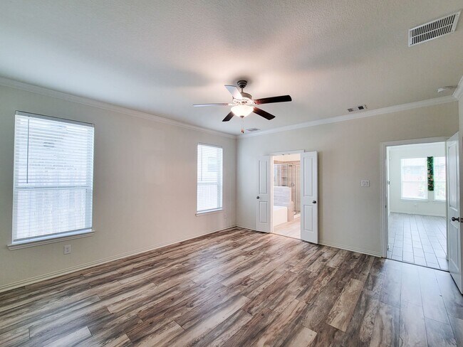 Building Photo - This thoughtfully designed home boasts 4 spacious bedrooms (2 down) and 3.5 baths, providing ampl...