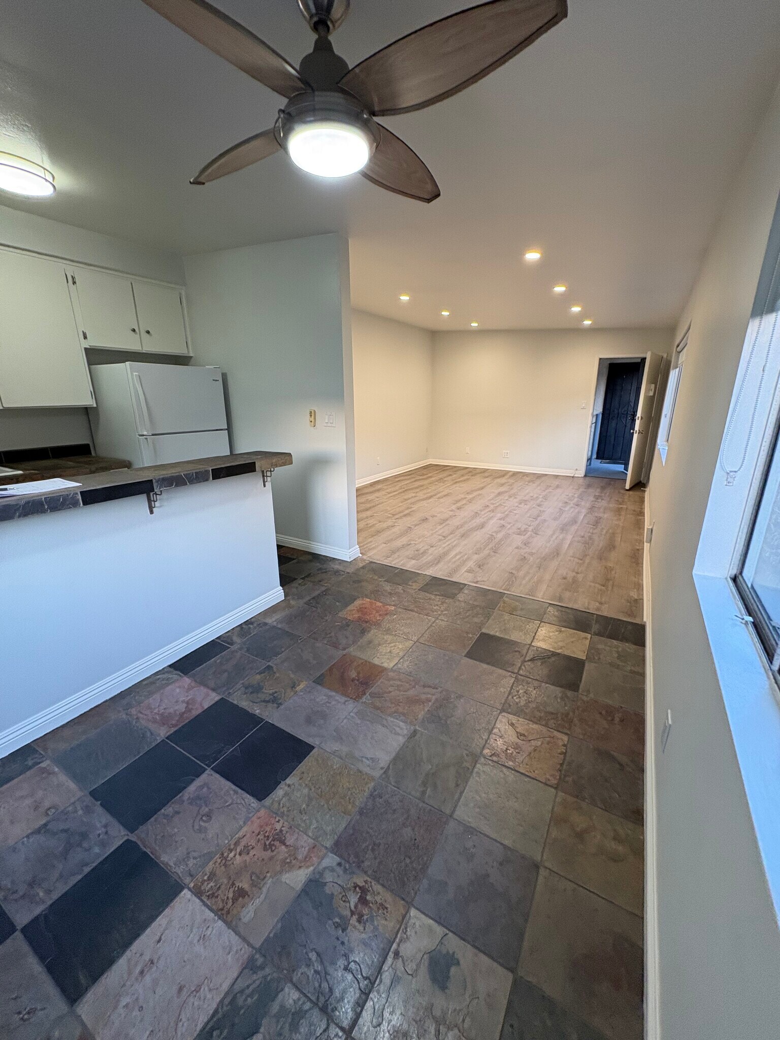 View from eating area into living area - 3322 Helms Ave