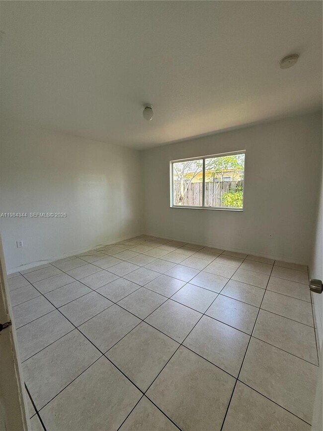 Building Photo - 3815 NW 13th Ave