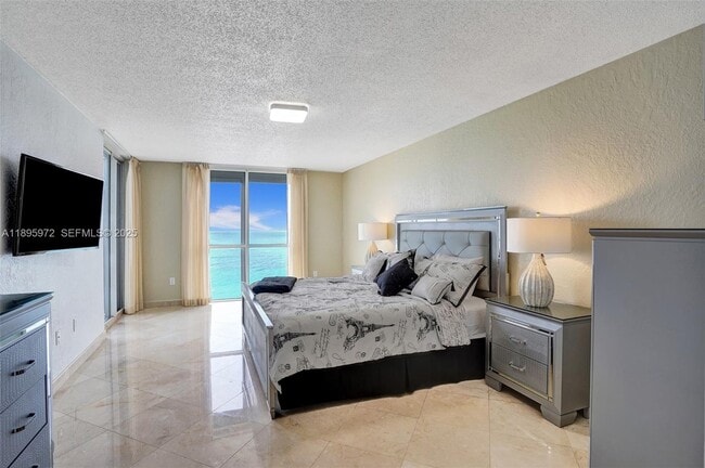 Building Photo - 16711 Collins Ave