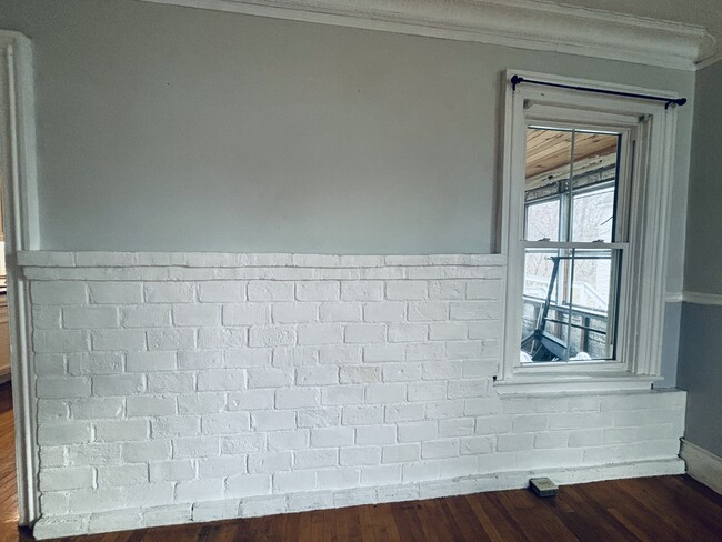 Brick work in living room - 83 Elm St