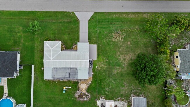 Building Photo - 3-Bedroom Punta Gorda Retreat with Marble Finishes & Stylish Furnishings!"