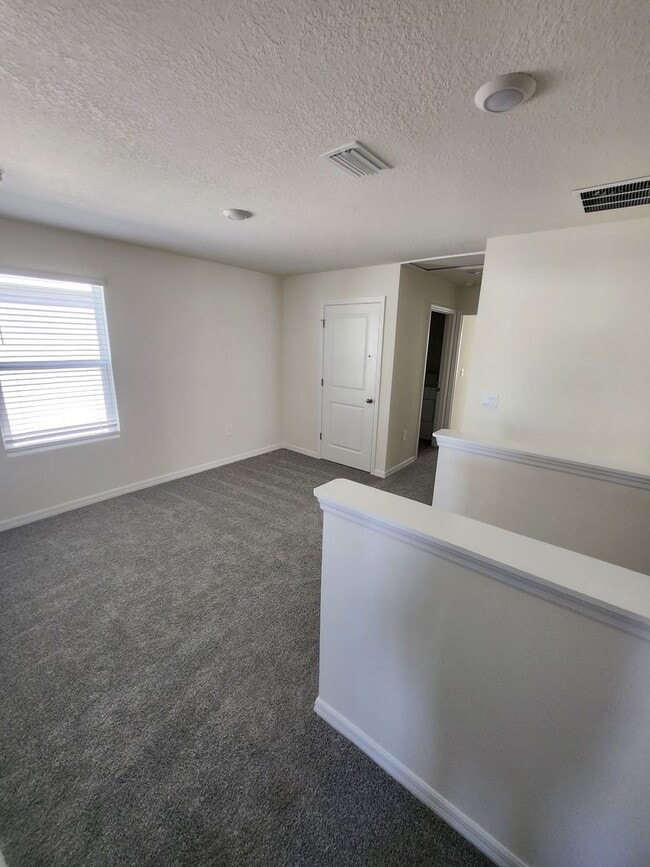 Building Photo - Spacious 4-Bedroom Modern Home in Oaks Preserve – Perfect Gainesville Location