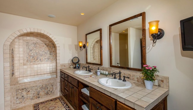 Building Photo - This Beautiful Hacienda Style Home combine...