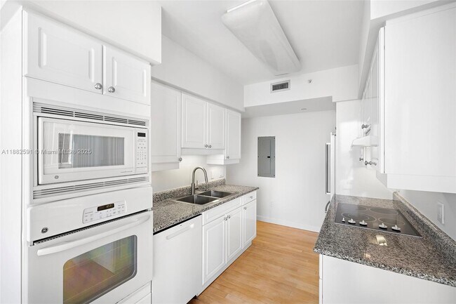 Building Photo - 4779 Collins Ave