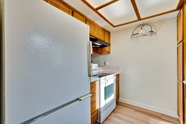 Building Photo - New Vinyl Plank Flooring, Fresh Interior Paint, 1 Car Garage + 1 Assigned Outdoor Parking Space -...