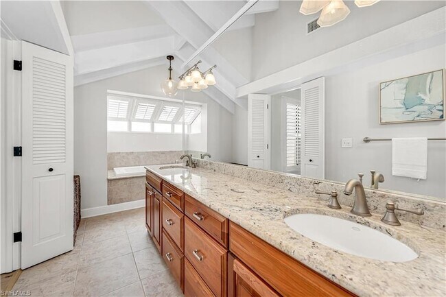 Building Photo - 5850 Pelican Bay Blvd