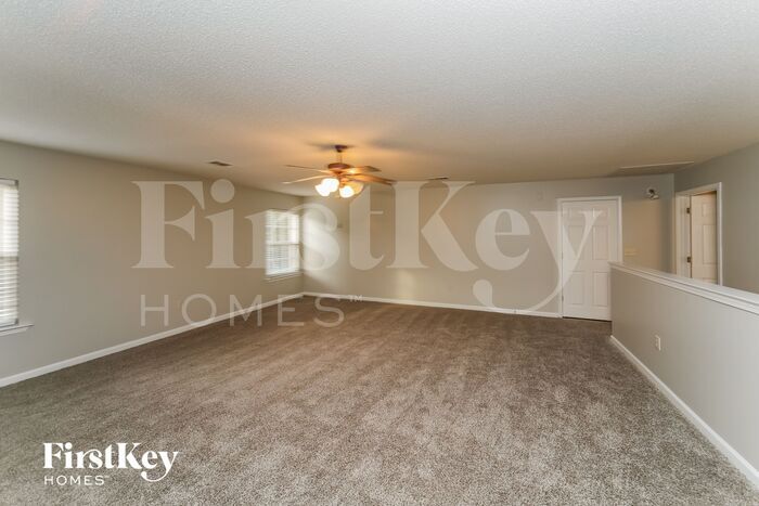Building Photo - 6358 Red Bird Dr