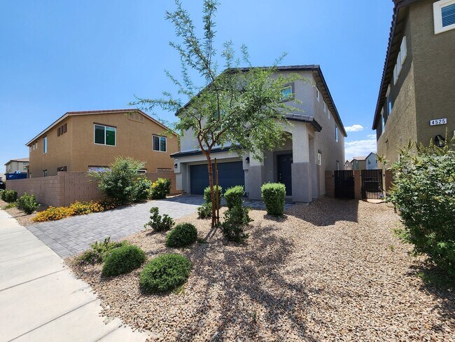 Building Photo - A Fairly New Home with 5 Bedrooms in a gated community
