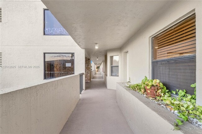 Building Photo - 3050 NW 42nd Ave