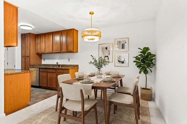 Building Photo - Modern 2-Bedroom Condo with Pool and Koi Pond Views