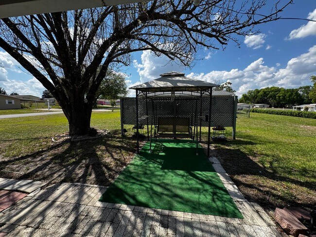 Building Photo - Charming Ocala Retreat in Peaceful 55+ Community – Move-In Ready!