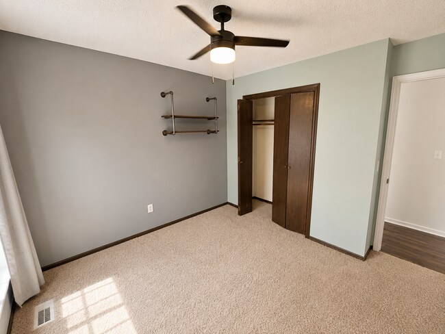 Building Photo - Spacious West Manhattan Home with Modern Updates, Oversized Garage & Prime Location
