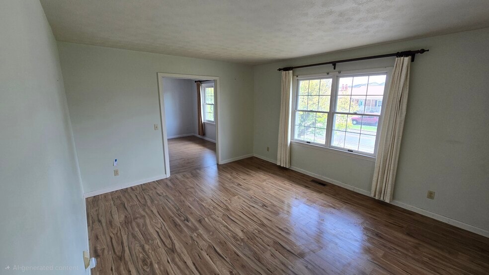 Sitting room view of living room and front house view - 790 Vine St