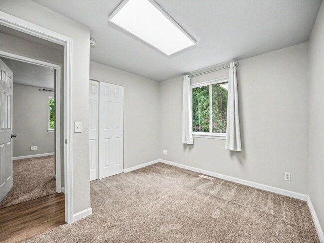 Building Photo - Spacious 4-Bedroom Lacey Home with A/C, Basement Bonus Space & Wetlands Privacy