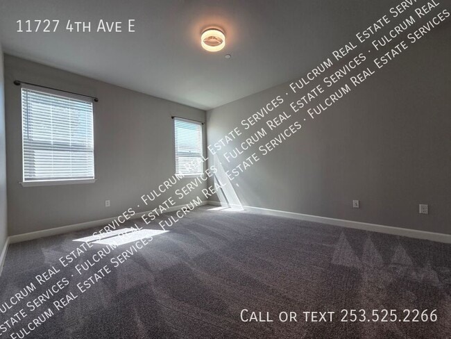 Building Photo - 11727 4th Ave E