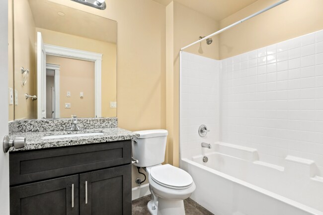 Building Photo - Spacious Two-Bedroom, Two-Bath Living at Marigold Apartments — Available Now