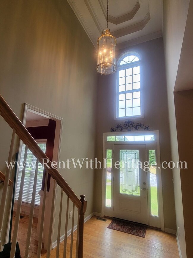 Building Photo - Gorgeous 3-Story Brick Home / 2 Fireplaces / Full Finished Basement / Chapel Hill Schools