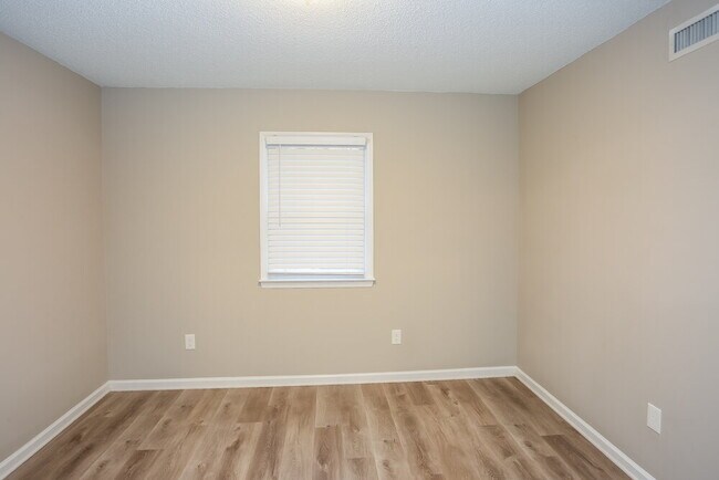 Building Photo - 6009 Burnt Mill Run