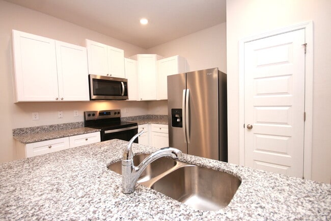 Building Photo - Move-In Specials! $500 Off + Military Disc...