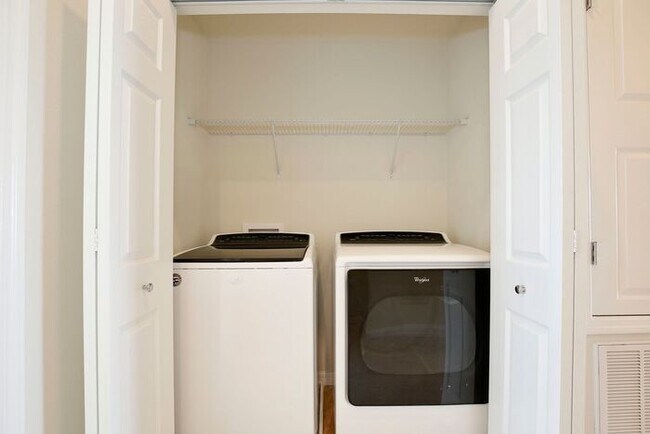 Building Photo - Immaculate Townhome · Dual En-Suite Bedrooms + Flex Loft · Cable & Internet Included · 3.5 Miles ...