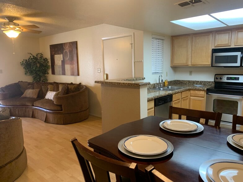 Furnished, ground floor, 2-bedroom condo with assigned covered parking.Pool,Spa,Tennis, Gym. - 5757 W Eugie Ave