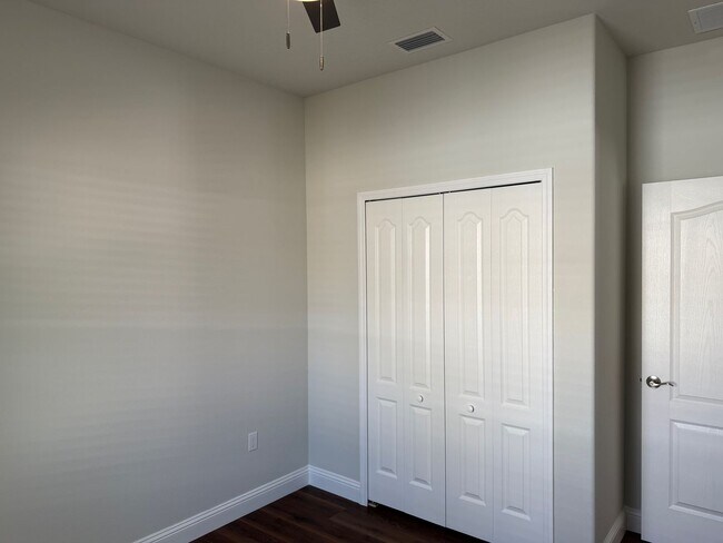 Building Photo - Brand new 3/2/1 with screed in porch and fenced yard! 2 units available