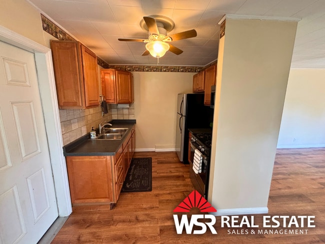 Building Photo - Move-in Ready! Utilities Included