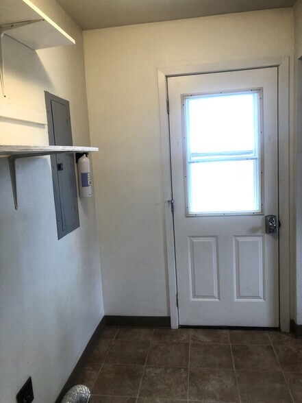 Rear Entrance. Off-street Parking Right by This Door. - 905 W 10th St