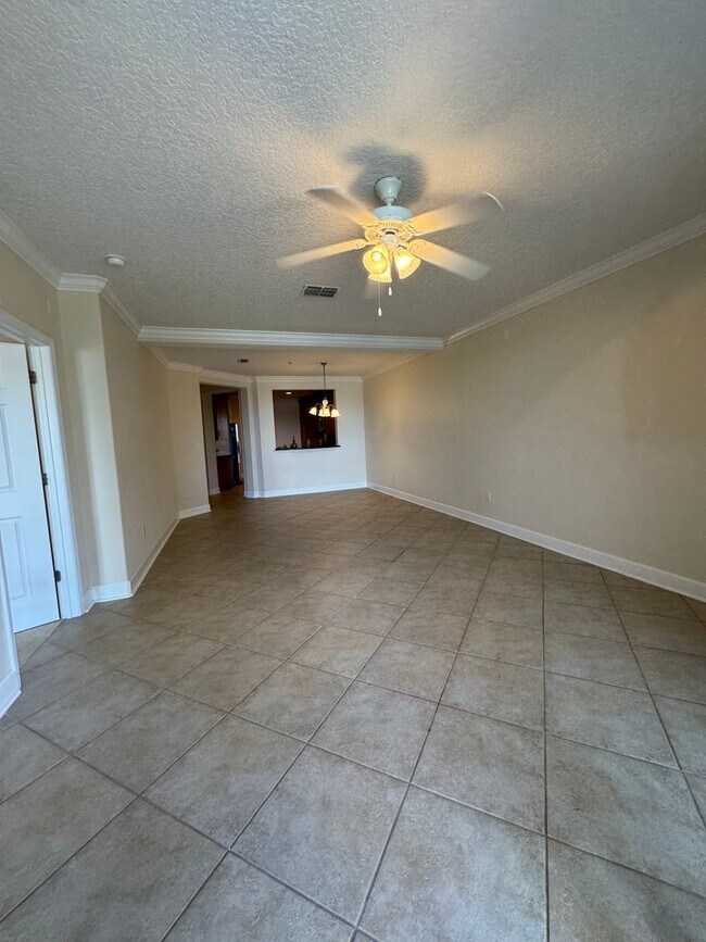 Building Photo - MOVE IN SPECIAL - CONDO LOCATE IN GATED COMMUNITY  IN DR. PHILLIPS-TOSCANA