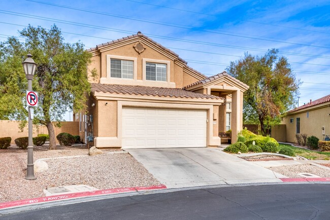 Building Photo - This 4-bedroom, 3-bathroom gem in a gated ...