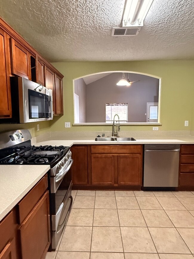 Building Photo - 2103 N Ensenada Cir SE