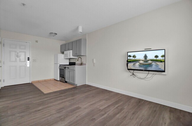 Building Photo - FIRST MONTH FREE- STUDIO APT- Available 1/...