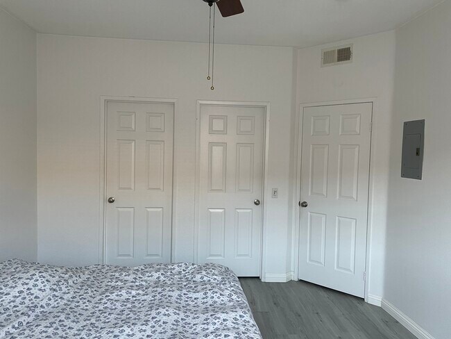 Master bedroom doors - bathroom, walk in closet, hallway (left to right) - 21832 S Vermont Ave