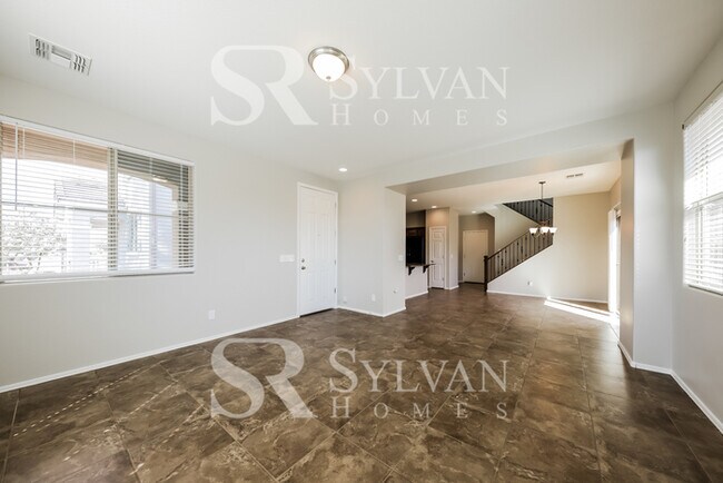 Building Photo - This home exudes a cheerful and welcoming charm!