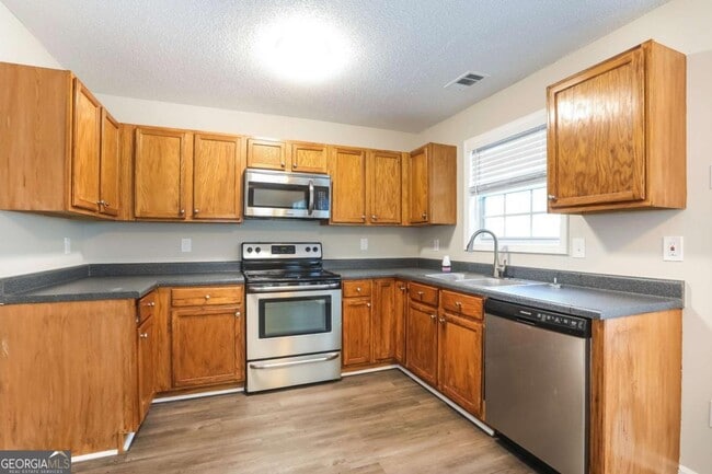 Building Photo - 6961 Mahonia Pl