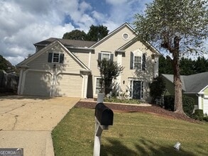 Building Photo - 12060 Carriage Park Ln